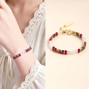 Detailed view of a colorful tourmaline crystal bracelet featuring elegant cube-cut beads.