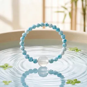 Natural Larimar and white crystal beaded bracelet for women featuring elegant ocean blue beads