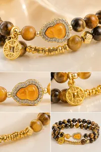 Close-up detail of double-strand yellow tiger eye bracelet with gold gourd and coin