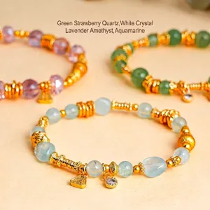New Chinese style crystal bracelet set with gold spacers and charms on beige background