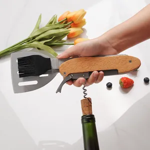 Versatile 4-in-1 stainless steel BBQ tool with wooden handle featuring a corkscrew and brush
