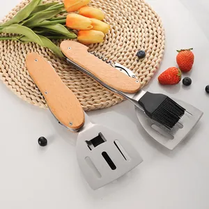 4-in-1 stainless steel BBQ tool set with wooden handle including spatula and brush