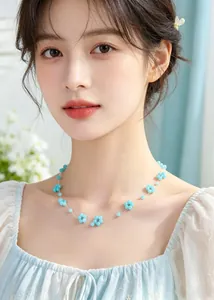 Beautiful close-up of light blue flower beaded amazonite necklace worn by a model