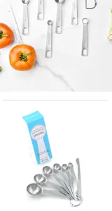 Stainless steel measuring spoon 7-piece set with engraved markings and blue packaging box