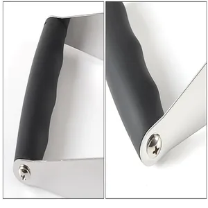 Close-up of ergonomic black handle and screw detail on stainless steel pastry blender