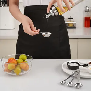 Premium 4-piece stainless steel measuring spoon set with engraved markings for baking and cooking
