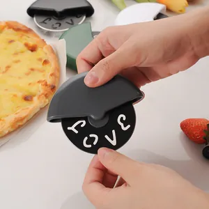 Stainless steel pizza cutter wheel with LOVE cutout design for baking