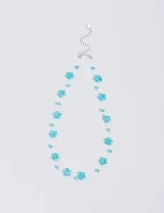 Close-up detail of handmade blue amazonite flower beaded necklace with silver chain clasp