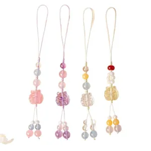 Handmade nine-tailed fox crystal beaded phone charms in various pastel colors