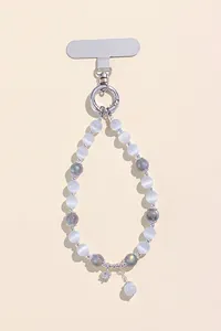 Detail of natural cat's eye and labradorite beaded phone strap with silver floral charm