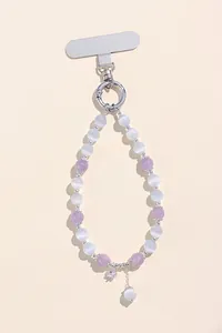 Elegant purple and white cat's eye beaded phone charm with a silver star pendant and hook