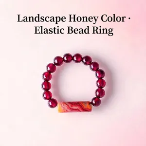 Natural garnet beaded elastic ring with a vintage thousand-line agate centerpiece.