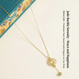Elegant Hetian jade ping an kou necklace with freshwater pearl accent in gold finish