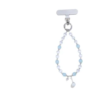 Light blue and white cat's eye beaded phone strap with silver star charm charm pendant