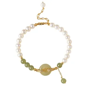 Natural freshwater pearl and Hetian jade beaded bracelet with elegant Ping'an buckle charm