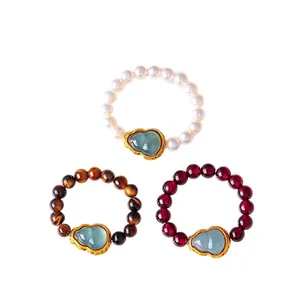 Elegant natural stone beaded rings with garnet, tiger eye and pearl with jade hulu charms.