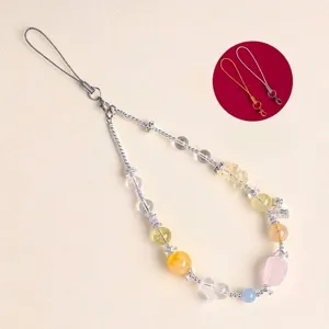 Dragonne de téléphone en perles de cristal naturel avec des breloques papillon et cœur