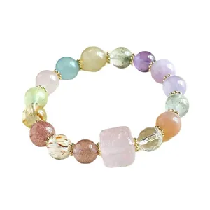Natural rainbow crystal bead bracelet with a carved pink rose quartz sugar cube charm.