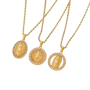 Detail view of three vintage stainless steel religious necklaces with crystal borders.