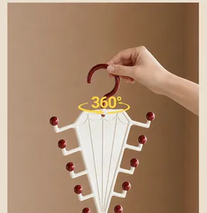 Close-up of 360-degree rotating V-shaped double-sided clothes storage hanger hook