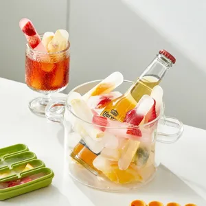 Green silicone ice pop mold for DIY fruit ice sticks used in summer chilled drinks