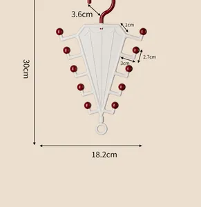 Detail view of the V-shaped storage hanger with precise measurements for wardrobe use.