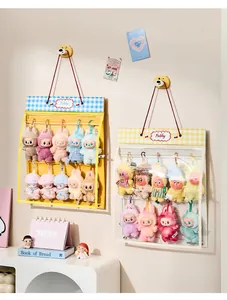 Transparent wall-mounted storage bag for organizing plush doll collections and Labubu figures