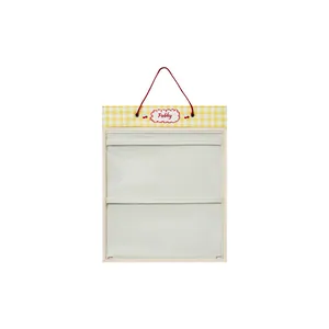 Yellow gingham hanging wall storage bag with transparent pockets for doll display