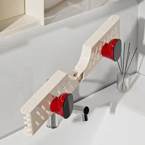 No-drill bathroom organizer rack with dual suction cups and drain holes for toiletries