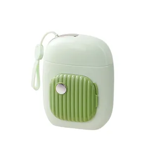 Minimalist portable light green acne removal tool kit case with a silicone hanging strap