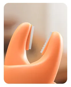 Close-up of multifunctional garlic peeler blades with smooth and serrated edges