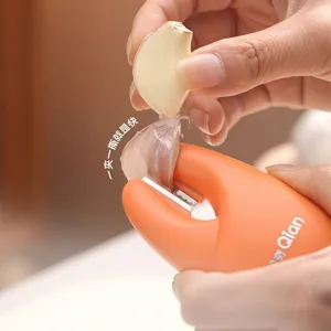 Ergonomic orange garlic peeling tool with tweezers for fast and easy skin removal
