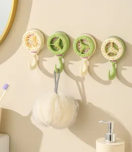 Decorative clock-shaped suction cup hooks for wall hanging in bathroom scenario