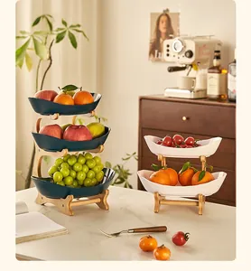 Multi-tiered fruit platter with bamboo stand for home snack and dessert storage