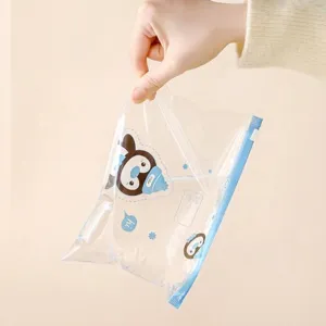 Transparent cartoon penguin storage bag with blue zipper for organizing kids clothes