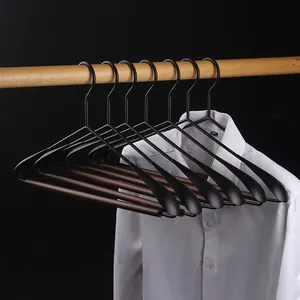 Premium beech wood and iron wide shoulder hangers for non-slip and trace-free coat storage