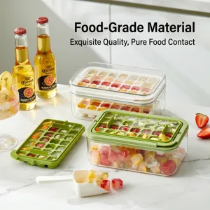 Clear flip-press ice cube tray set with large storage container and white ice scoop