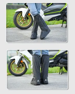 Detailed view of black waterproof high-tube shoe covers with reflective safety strips