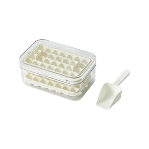 Minimalist white flip-press ice cube tray set with transparent storage box and scoop