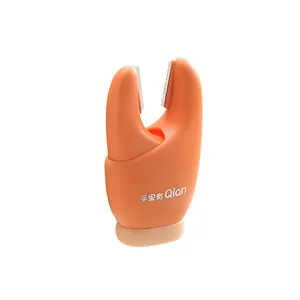 Multifunctional orange garlic peeler tool with magnetic design for home kitchen use.