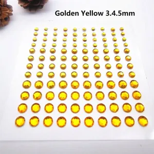 Detalle de diamantes de imitación acrílicos de color amarillo dorado en tamaños 3, 4 y 5 mm
