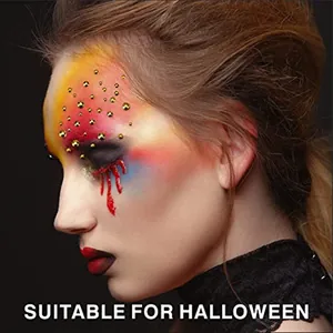 Halloween face stickers with gold rhinestones and red tear drops for creative makeup