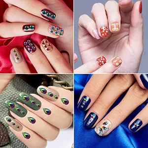 Detailed view of colorful laser water drop and pearl rhinestones for nail and face art