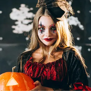 Detailed view of red and black face jewels specifically for Halloween costume makeup