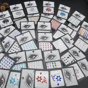 Multiple packs of colorful decorative face gem stickers in teardrop and star shapes