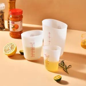 Set of three translucent food-grade silicone measuring cups with dual ounce and ml scales