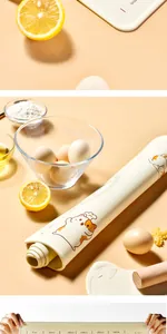 Close-up detail of the thick non-slip silicone kneading mat featuring a cute orange cat print
