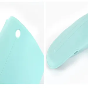 Close-up detail of light blue silicone oven mitt showing hanging hole and durable seam