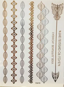 Tijdelijke metalen tattoo-stickers in goud en zilver met blad- en pijlontwerpen
