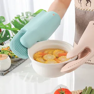 Thickened silicone oven mitts for heat protection in Nordic style kitchen cooking use